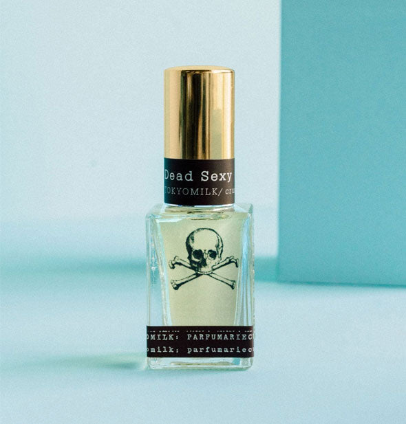 Rectangular glass Dead Sexy perfume bottle with skull and crossbones design