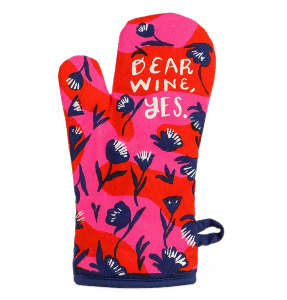 Pink and red oven mitt with navy blue floral design accents says, "Dear Wine, Yes." in white lettering
