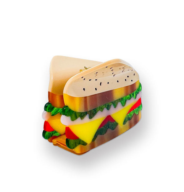 Hair clip designed to resemble a sandwich with lettuce, meat, cheese, and tomato on rye bread