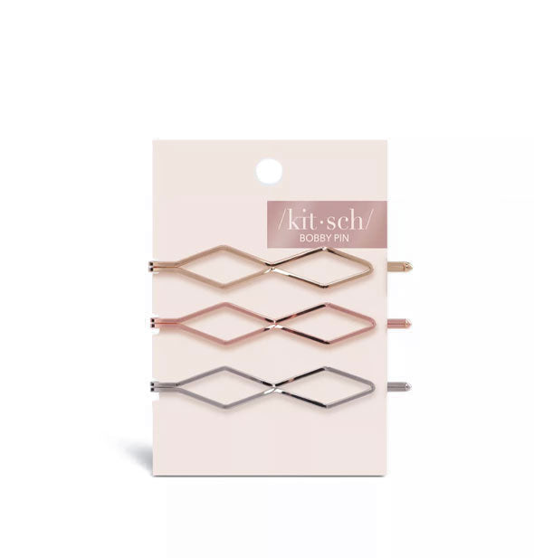 Pack of three diamond-shaped gold, rose gold, and silver bobby pins by Kitsch