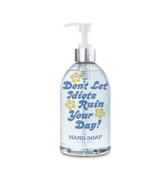16.9 ounce bottle of liquid hand soap says, "Don't Let Idiots Ruin Your Day!" in blue bubble script lettering accented with smiley face daisy graphics