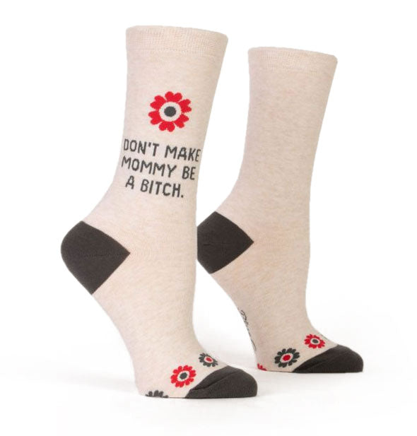 White socks with dark gray and red details say, "Don't make mommy be a bitch."