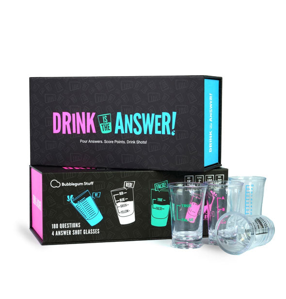 Two black with purple and blue print Drink is the Answer game boxes stacked one on top of the other with included shot glasses in the foreground