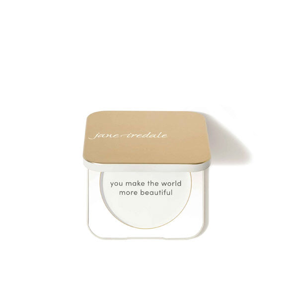 Square Jane Iredale compact with rounded corners says, "You make the world more beautiful" on its interior