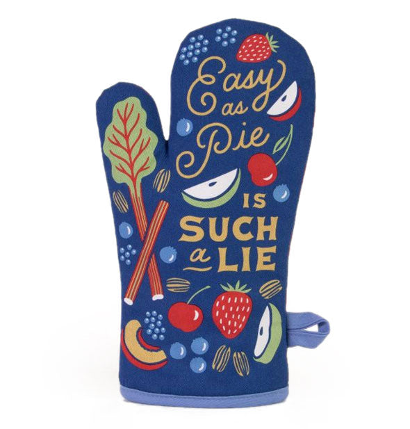 Dark blue oven mitt with all-over food illustrations says, "Easy as pie is such a lie" in gold lettering of alternating type styles