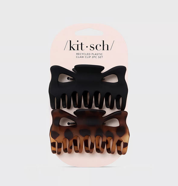Matte black and matte brown tortoise recycled plastic hair claw clips on a light pink Kitsch product card