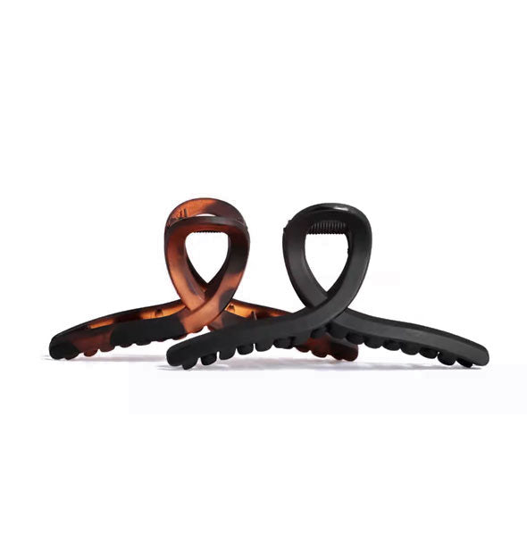 Two loop shape claw clips, one black and one brown tortoise