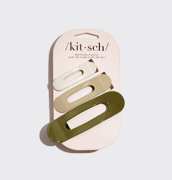 Pack of three Recycled Plastic Flat Lay Claw Clips by Kitsch on product card includes one small white clip, one medium tan clip, and one large green clip