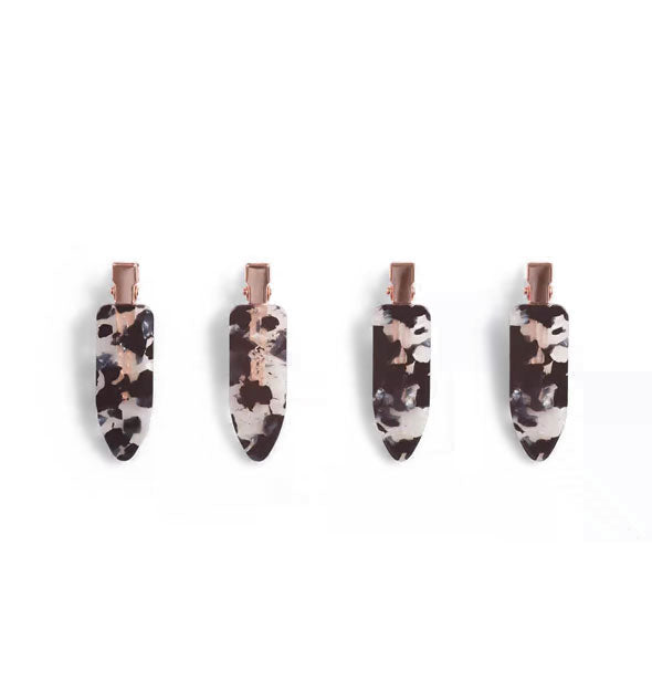 Four terrazzo-effect hair clips with rose gold hardware