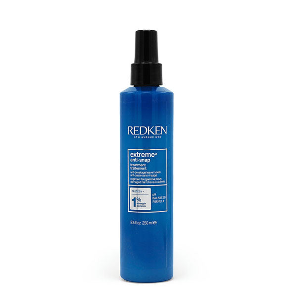 8.5 ounce blue bottle of Redken Extreme Anti-Snap Treatment with black spray nozzle