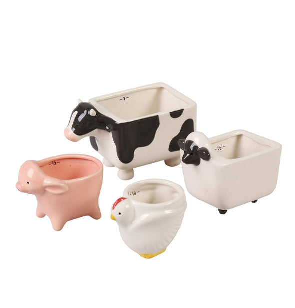 Set of cow, sheep, pig, and chicken measuring cups