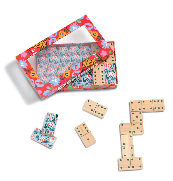 Colorful floral box of dominoes with some pieces removed