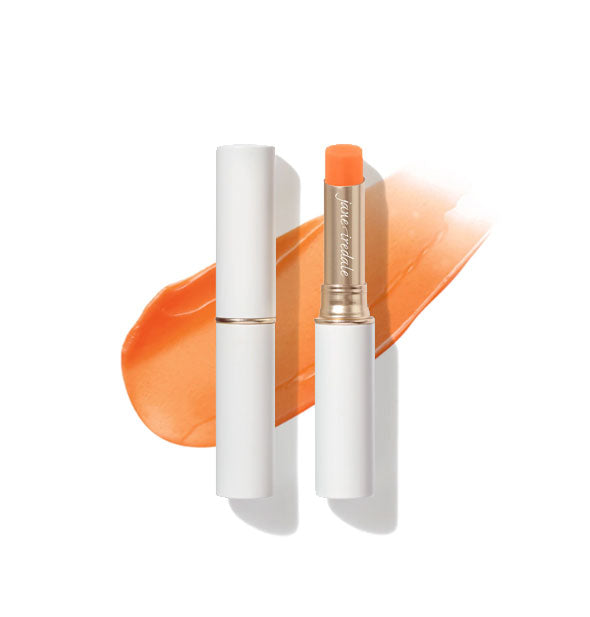 White and gold tubes of Jane Iredale Just Kissed Lip and Cheek Stain, one with cap removed to reveal the tip, and a sample product application behind both in the shade Forever Peach