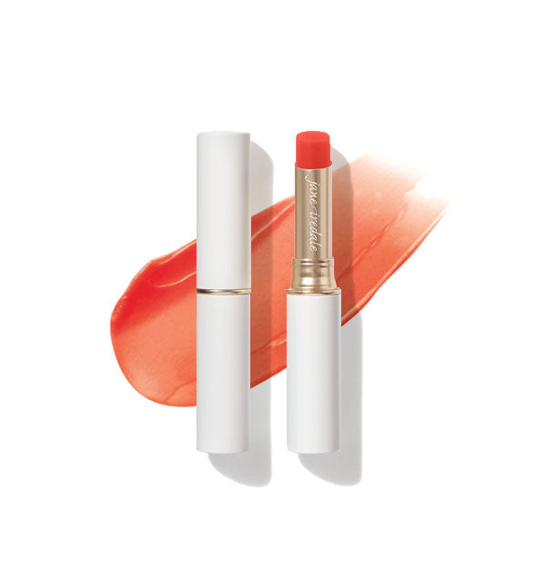 White and gold tubes of Jane Iredale Just Kissed Lip and Cheek Stain, one with cap removed to reveal the tip, and a sample product application behind both in the shade Forever Red