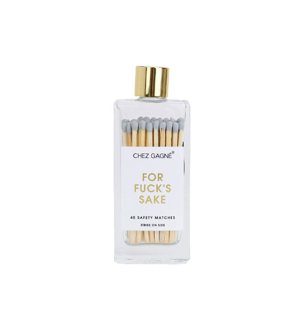 Rectangular glass bottle containing 40 gray-tipped Chez Gagné safety matches and topped with a gold lid says, "For fuck's sake" in gold foil