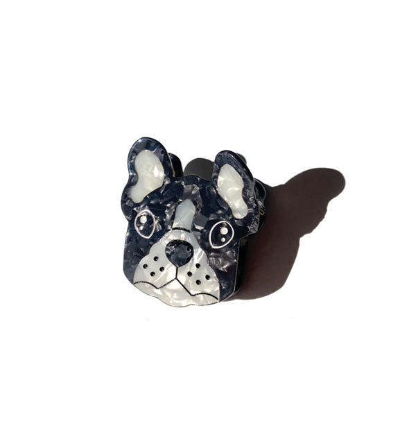 Black and white quartz-effect French bulldog face hair clip with painted eyes, nose, mouth, and whisker details