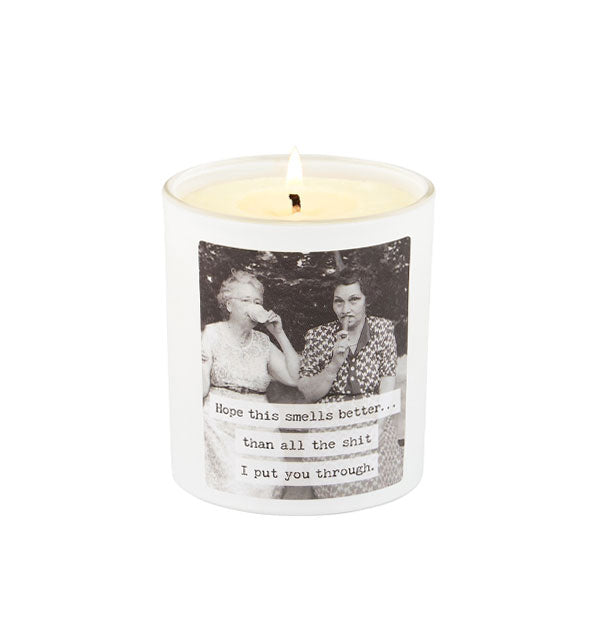 Lit jar candle features a black and white photograph of two women with the caption, "Hope this smells better...than all the shit I put you through."