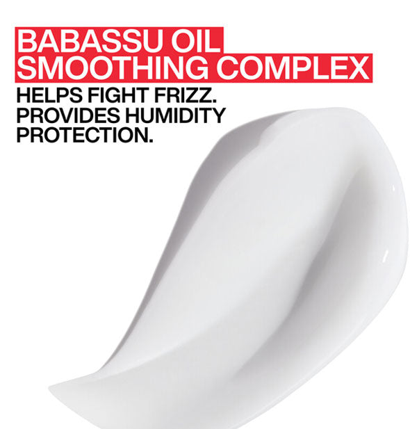 Closeup of a blob of Redken Frizz Dismiss Mask is labeled, "Babassu Oil Smoothing Complex: Helps fight frizz. Provides humidity protection."
