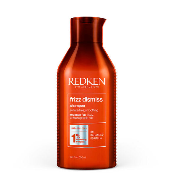 Red 16.9 ounce bottle of Redken Frizz Dismiss Shampoo