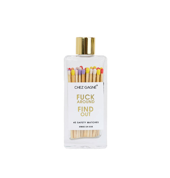 Rectangular glass bottle containing 40 Chez Gagné safety matches with multicolored tips and topped with a gold lid says, "Fuck around find out" in gold foil