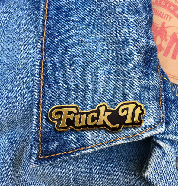 Fuck It pin on jean jacket lapel