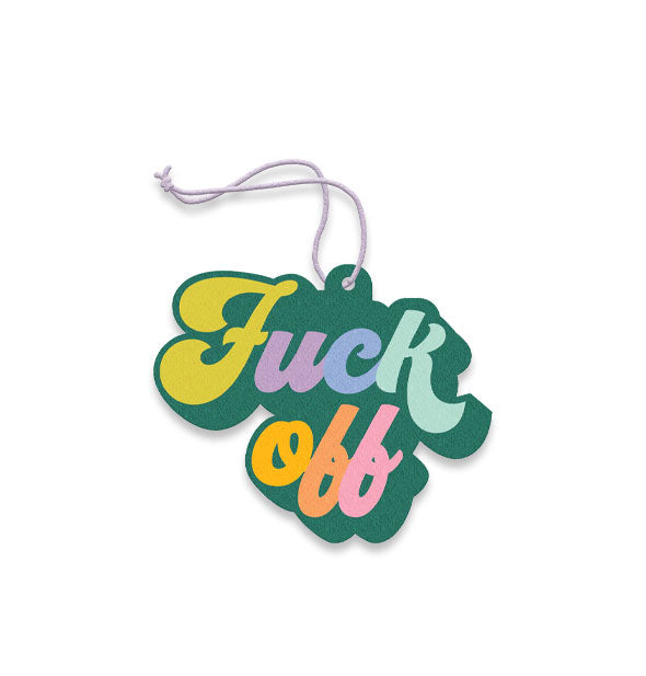 Dark green air freshener on a light purple string says, "Fuck off" in multicolored retro-style script lettering