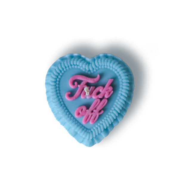 Blue heart-shaped candle is designed to resemble a decoratively frosted cake that says, "Fuck off" in pink script on top