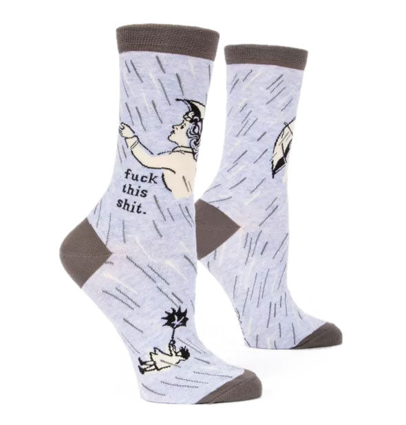Blue crew socks with grey top band, heel, and toe feature rainy motif with girl holding an umbrella and say, "Fuck this shit."