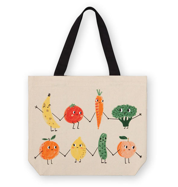 Canvas tote bag with black handles features design of colorful produce with friendly faces holding hands