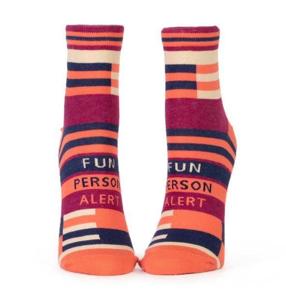 Pair of colorful graphic socks that each say, "Fun Person Alert"