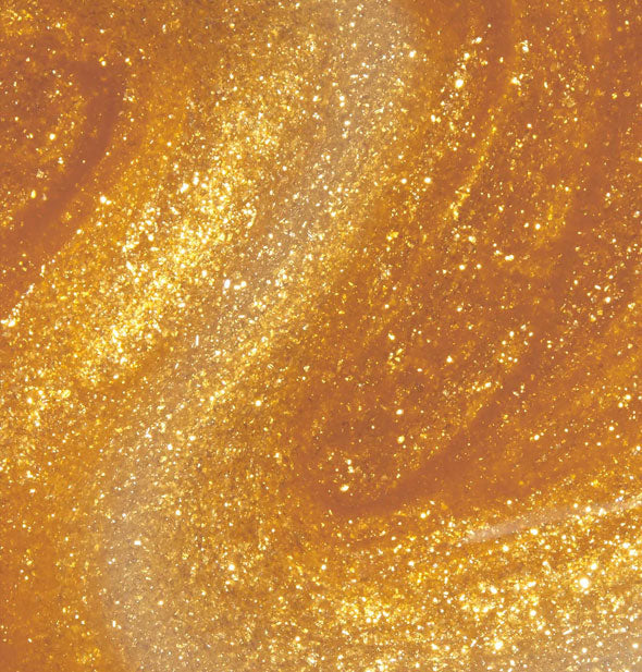 Closeup of shimmery orangey-gold nail polish