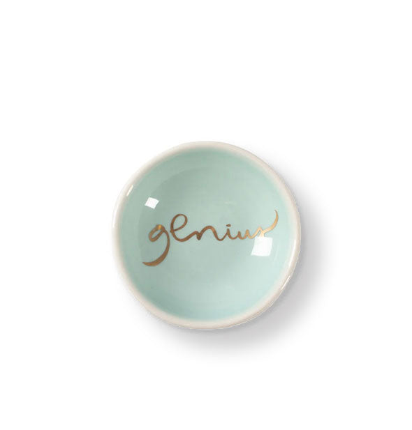 Small round aqua dish says, "Genius" in the bottom in metallic gold script