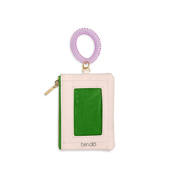 Rectangular white Ban.do pouch with green zipper and gold hardware features a green ID window and spiral wrist strap