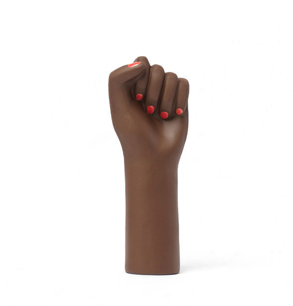 Vase shaped like a raised fist in a dark skin tone with red fingernails