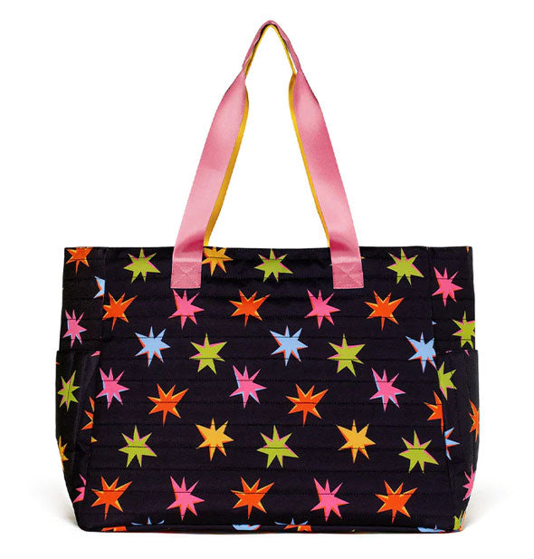 Black shoulder bag with pink strap and all-over colorful starburst print