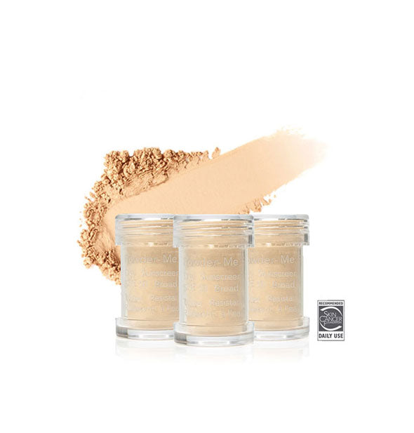 Three refill canisters of Jane Iredale Powder-Me SPF 30 Dry Sunscreen with enlarged swiped sample application behind them in shade Golden
