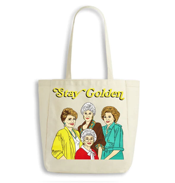 Canvas tote bag features colorful illustrated portrait of the four main Golden Girls TV show characters under the words, "Stay Golden" in yellow lettering with black shadow effect