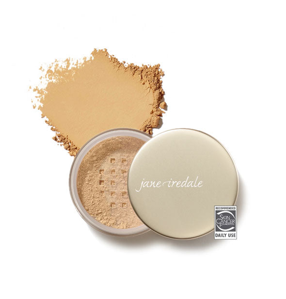 Opened compact of Jane Iredale Amazing Base Loose Mineral Powder and sample product swatch in shade Golden Glow with the Skin Cancer Foundation seal at lower right