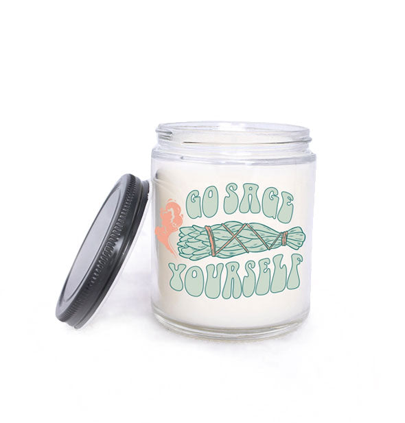 Jar candle says, "Go Sage Yourself" in retro-style green lettering around a smoking sage bundle illustration; a black screw-top lid sits to the side