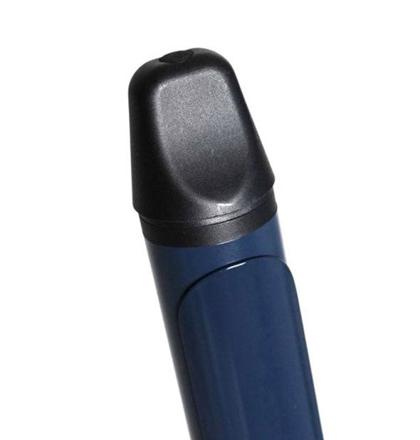 Closeup of the cool-touch black tip of a curling iron