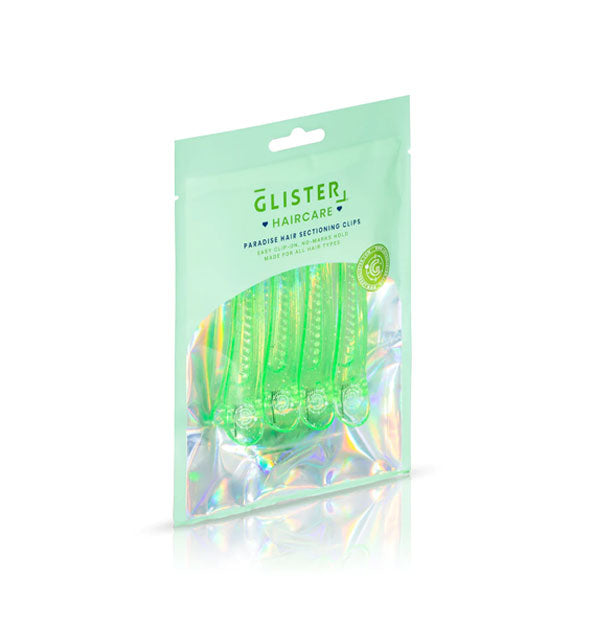 Pack of four green glitter Glister Haircare Paradise Hair Sectioning Clips with holographic packaging interior