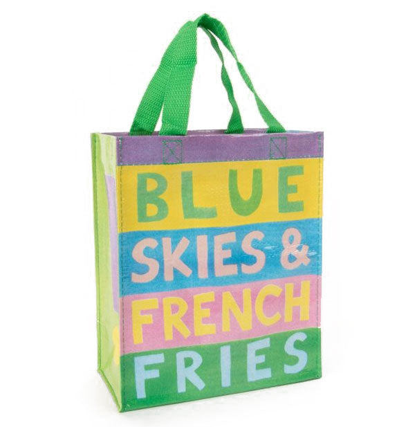 Tote bag with purple, yellow, blue, pink, and green stripes says, "Blue Skies & French Fries" in alternating colors