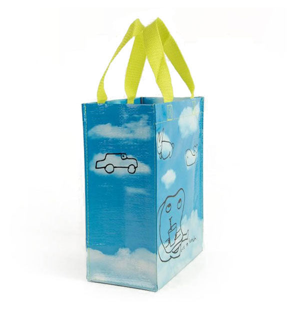 Tote bag with bright yellow-green handles features all-over blue sky and puffy white clouds imagery with childlike drawings outlining some of them
