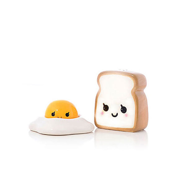 Set of salt and pepper shakers designed to resemble a piece of bread or toast and a fried egg, each with a painted smiling face