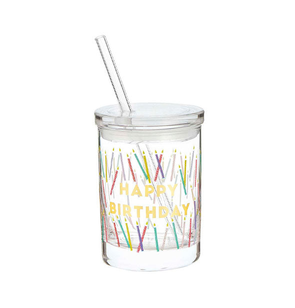 Glass old fashioned tumbler with lid and straw says, "Happy Birthday" in gold lettering surrounded by colorful candles on all sides