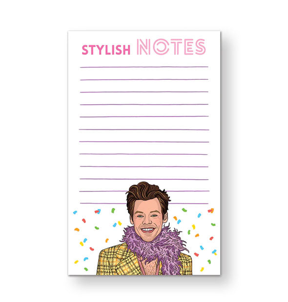Rectangular white lined notepad featuring illustration of smiling Harry Styles at the bottom wearing a yellow plaid jacket and purple boa and surrounded by colorful confetti says, "Stylish Notes" at the top in pink lettering