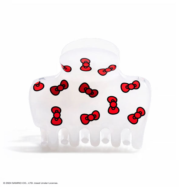 White snubby claw clip with small red bow designs all over