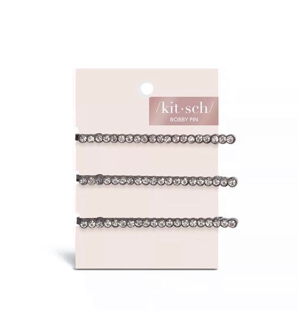 Pack of three hematite rhinestone-covered bobby pins on a light pink Kitsch product card