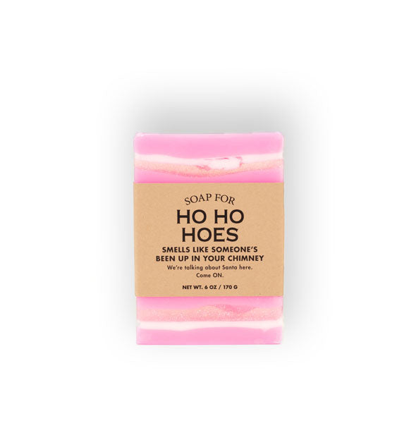 Bar of Soap for Ho Ho Hoes is pink with white streaks and wrapped in brown paper with black lettering