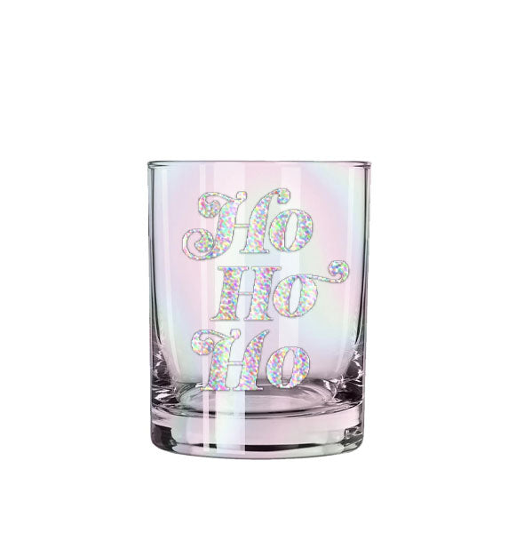 Rocks glass with slight iridescents says, "Ho Ho Ho" in silvery holographic lettering